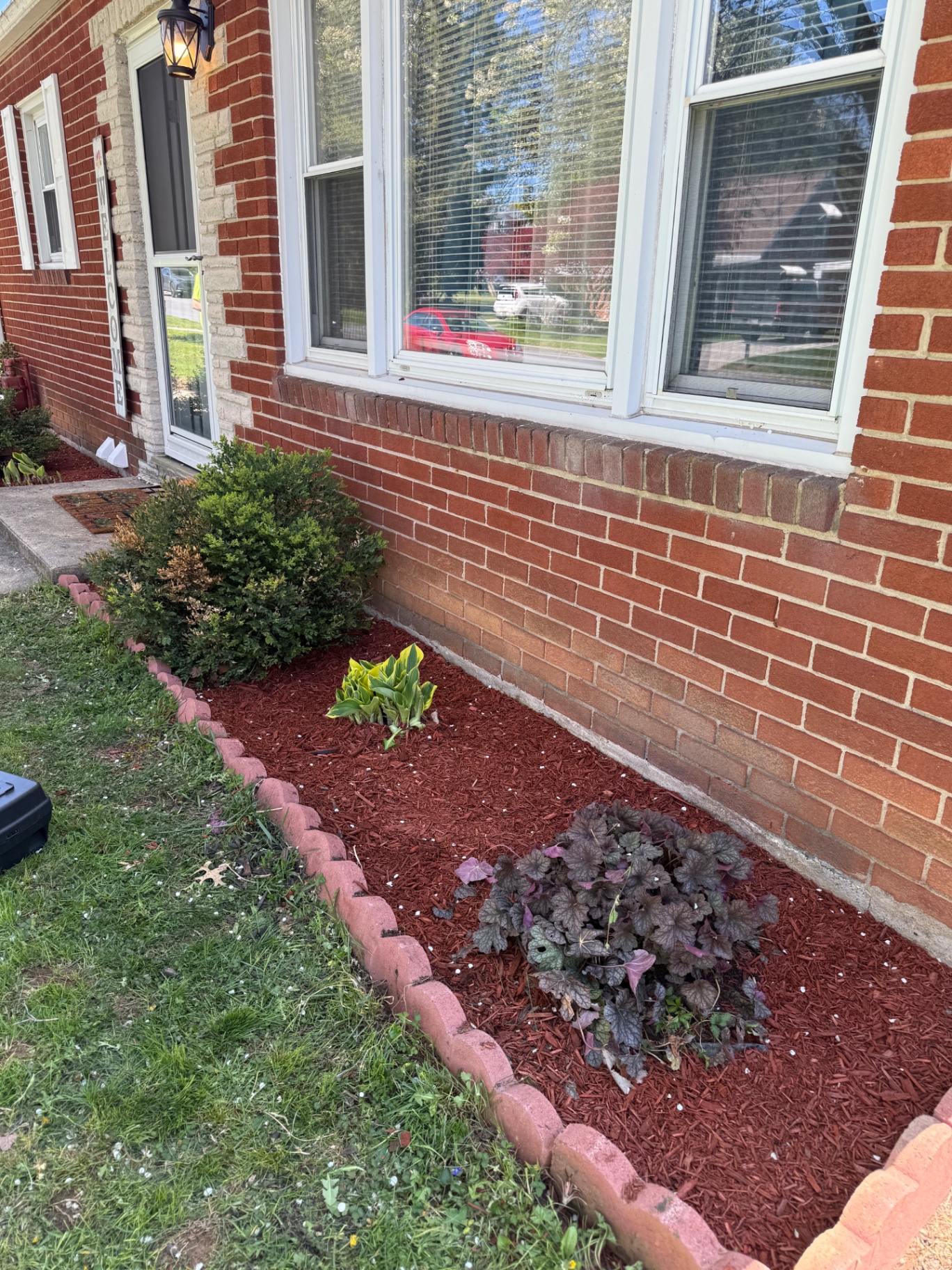 Front bed mulch transformation after